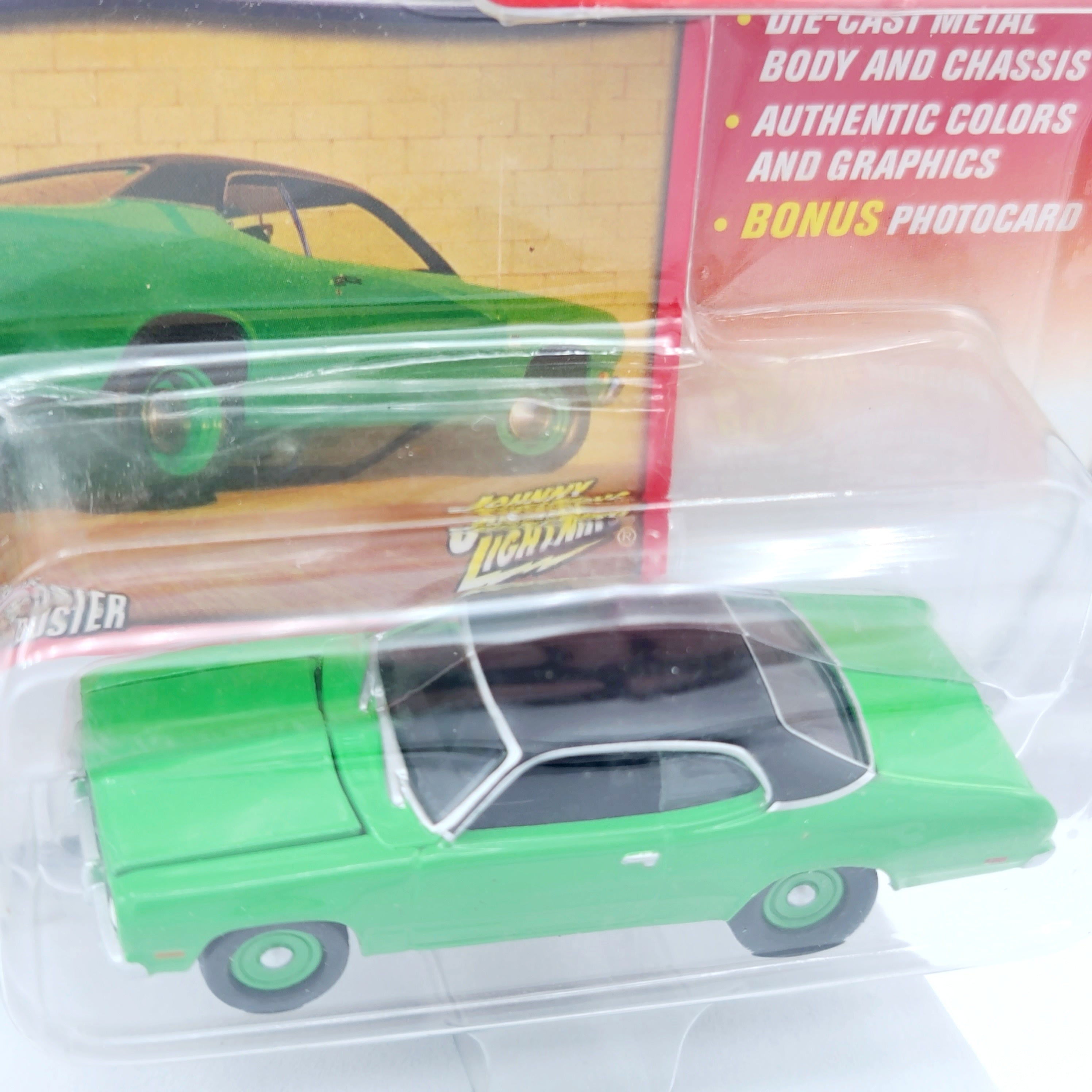 Johnny Lightning '71 Plymouth Duster - 1:64, w/ Photo Card (2003 Mopar or No Car Rel 1)